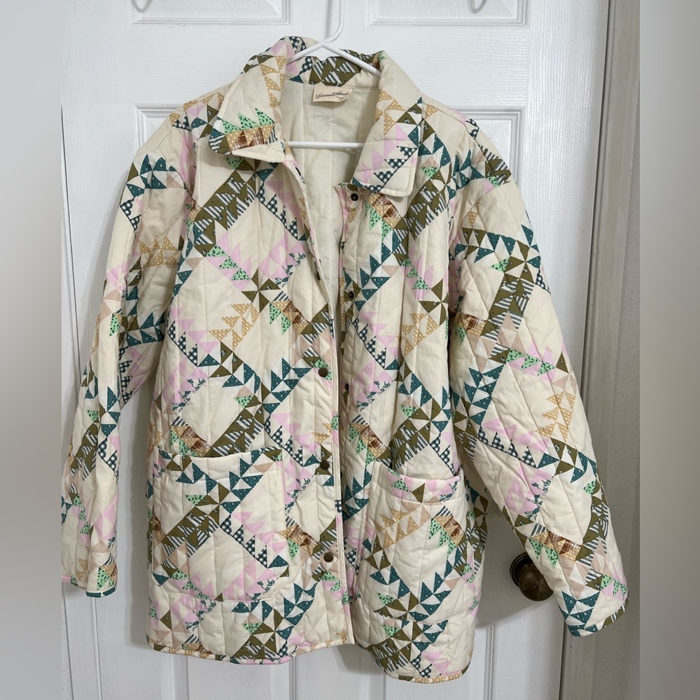 Triangle patchwork quilt coat in neutral colors